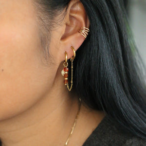 duo de boucles en acier inoxydable doré et perles fines orangées