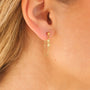 Boucles d'oreilles en péridot vert à chaîne, hypoallergénique.