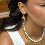 Boucles d'oreilles en perle d'eau douce, acier inoxydable doré.