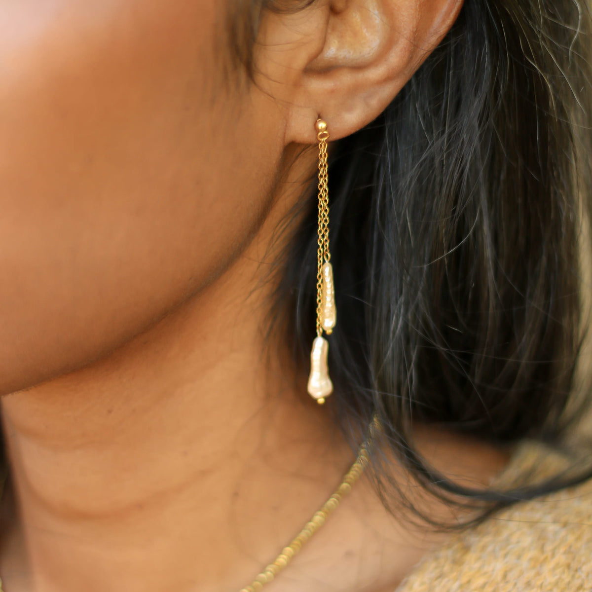Boucles d'oreilles Perles orangées longues chaîne