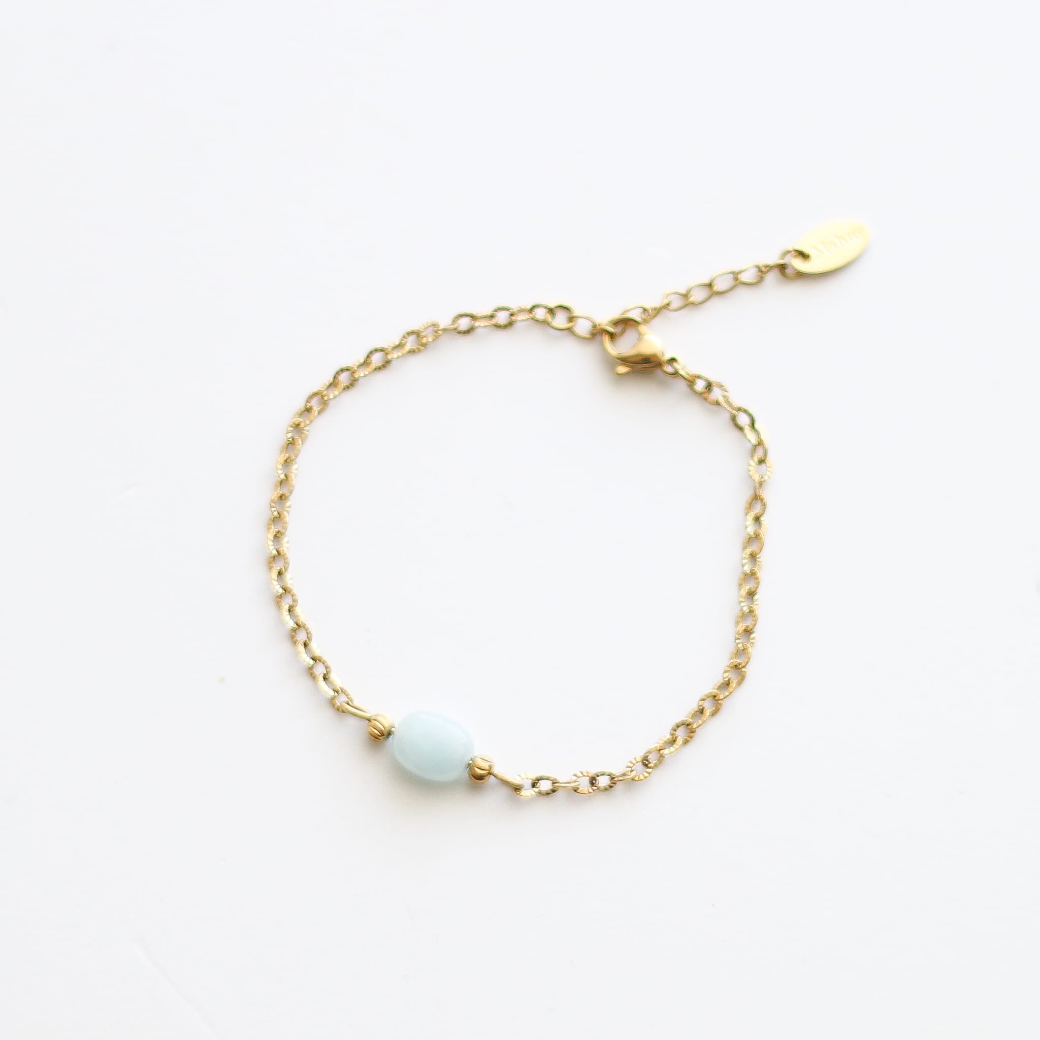 Bracelet en aigue-marine sur chaîne acier inoxydable.