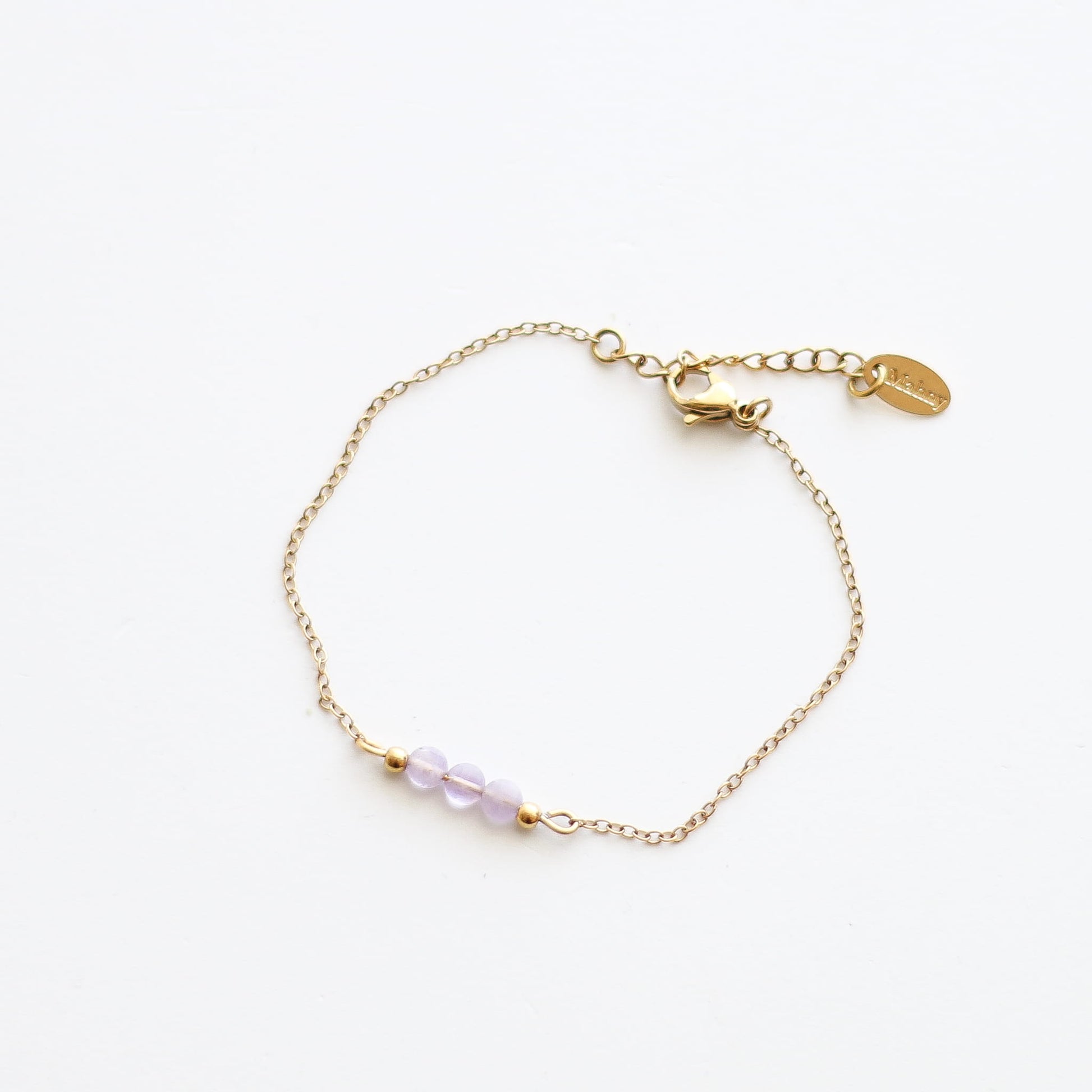 Bracelet en améthyste lavande sur chaîne acier inoxydable.
