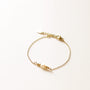 Bracelet perle d'eau douce fin, détail des pierres, pierre véritable, signé Mahny.