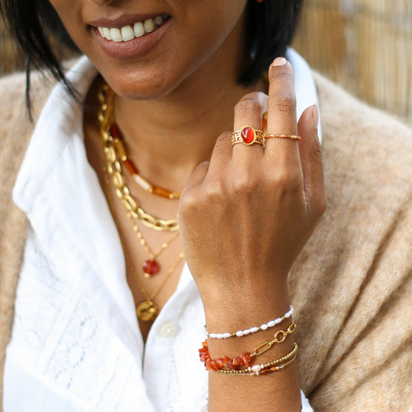 bracelet perle grenat orange acier femme
