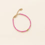 Bracelet perlé en Rubellite rose tendance avec détails doré