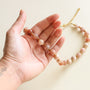 collier de perles d'Aragonite et d'Agate avec détails dorés