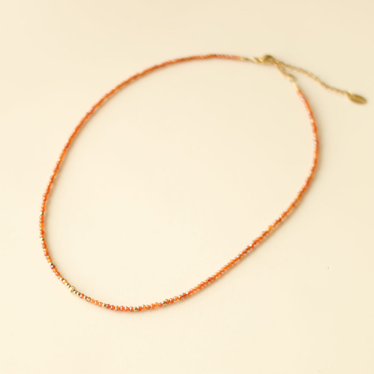 Collier Zirkon rouge orange perlé