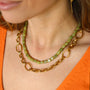 Collier chaîne Anneau, gros plan sur la pierre, pierre véritable, signé Mahny.