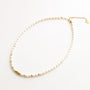 Collier en perle d'eau douce, assemblé à la main.