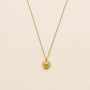 collier à chaine fine et pendentif coeur doré