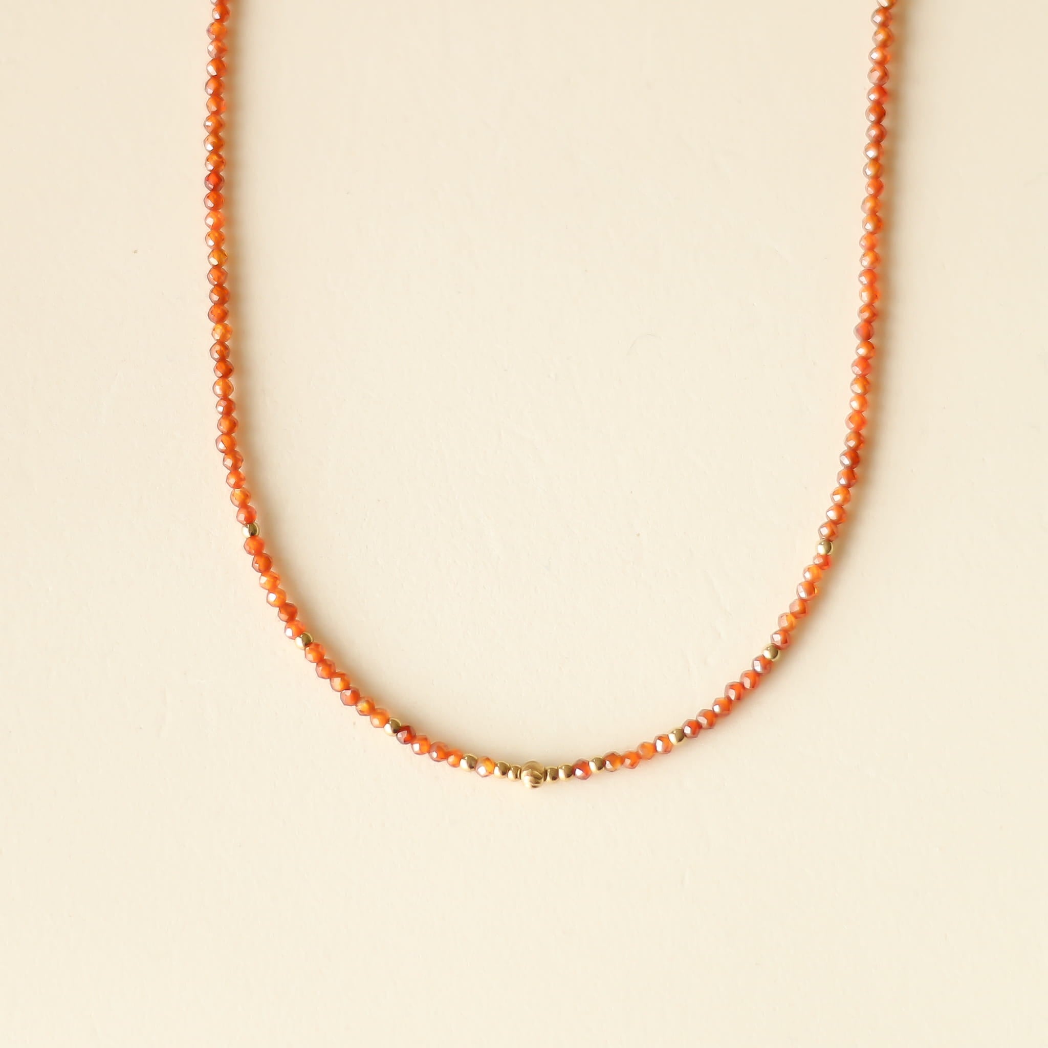 Collier Zirkon rouge orange perlé