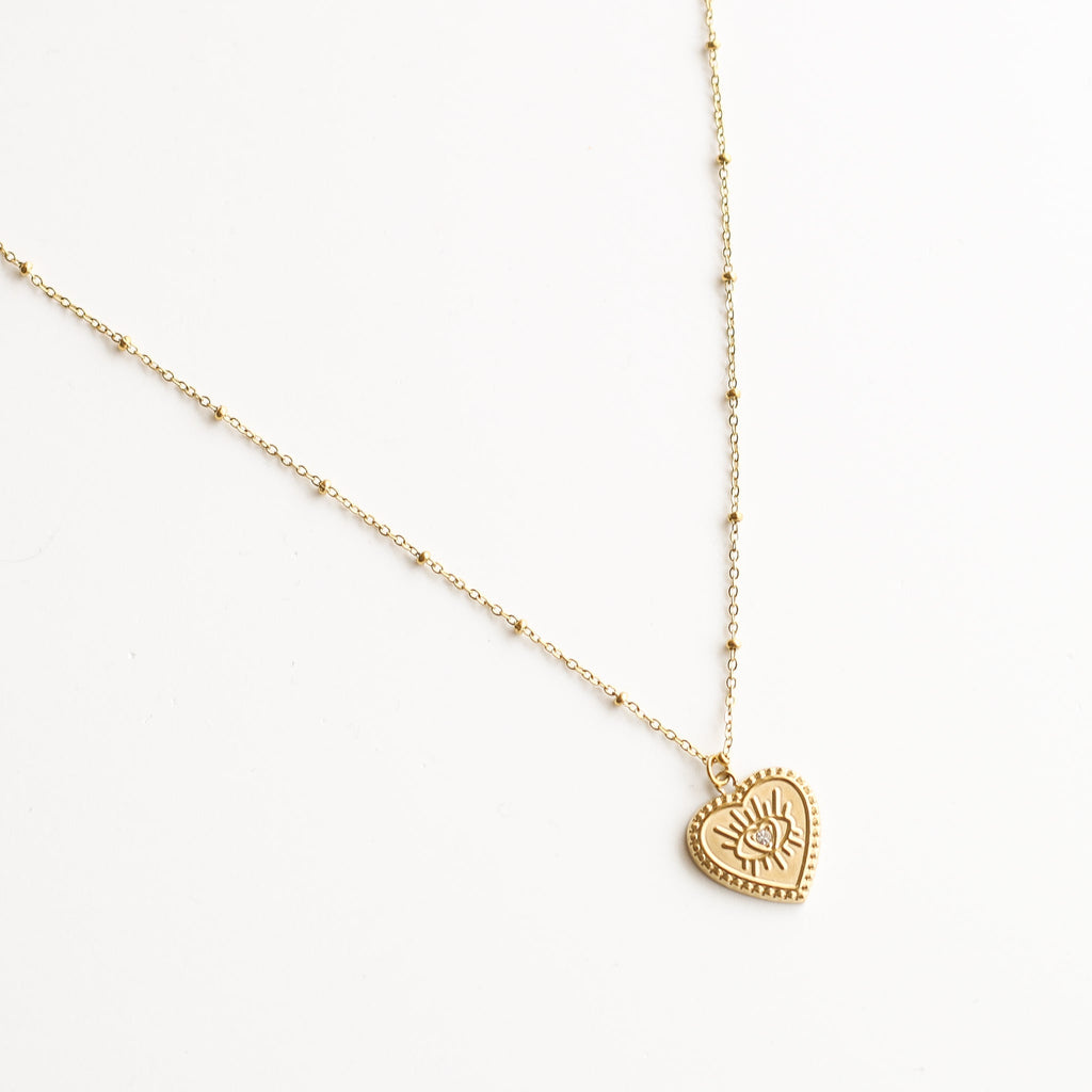 collier doré femme oeil protecteur